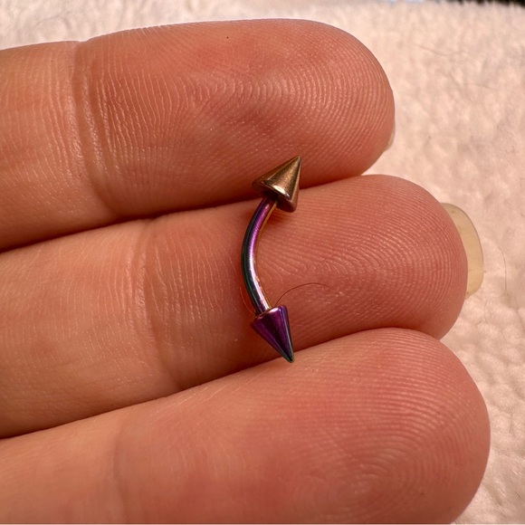 Curved annonized barbell with dual spikes. - Picture 7 of 7